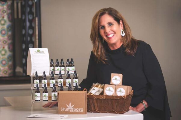 Susan with CBD products