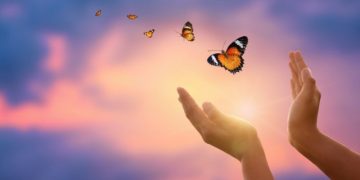 Shoulding Yourself In Midlife? Why Optimism Is The Bold Rebellion You Need